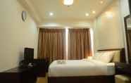 Kamar Tidur 3 Exclusive 2 BR Gandaria Heights Apartment with Mall Access by Travelio