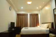 Kamar Tidur Exclusive 2 BR Gandaria Heights Apartment with Mall Access by Travelio