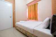 ห้องนอน Modern 2BR Green Pramuka Apartment