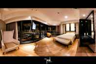 Bedroom Luxury Room at The Peak Residence by Mitsukoka