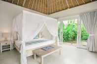 Kamar Tidur Villa Escape at Sandy Bay Beach