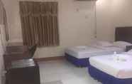 Kamar Tidur 5 Jeamco Royal Hotel - Baybay