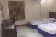 Kamar Tidur Jeamco Royal Hotel - Baybay