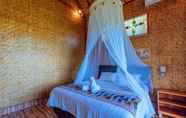 Kamar Tidur 2 Atuh Forrest Cottage