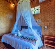 Kamar Tidur 2 Atuh Forrest Cottage