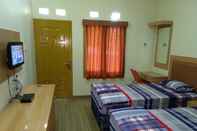 ห้องนอน Budget Room at FIFA Homestay Pati Syariah