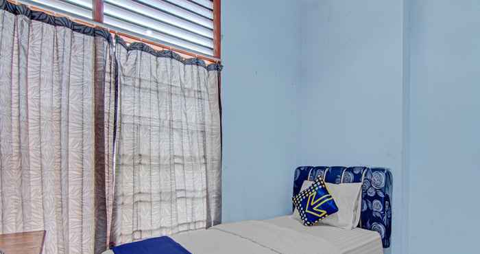 Bilik Tidur OYO 90468 Monalisa Guesthouse