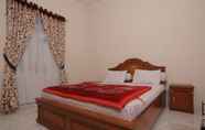 Phòng ngủ 5 Merapi Singgalang Guest House