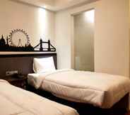 Bedroom 7 Hotel Sanrina Makassar