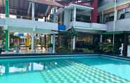 Kolam Renang 2 Family Room at BISMO 6 (1 Bedroom) by Hotel Azaya