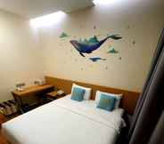 Bedroom 6 Qlio Hotel 