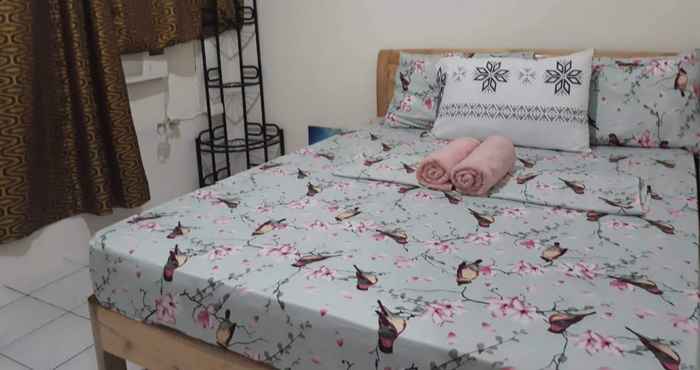 Kamar Tidur West Coast Beach House Moalboal