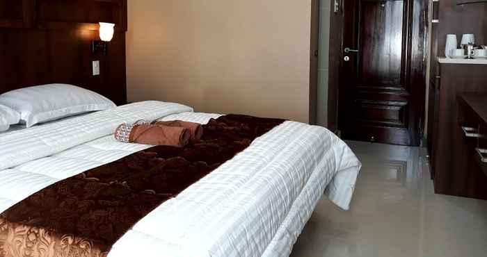 Kamar Tidur Tobali Guest House