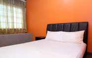 Bilik Tidur 4 Hotel Fifteen Avenue Inn - OYO TM