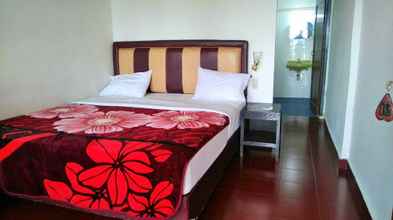 ห้องนอน 4 Hariara Guest House Samosir