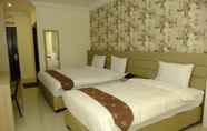 Kamar Tidur 4 Hotel Grand Puri Perintis