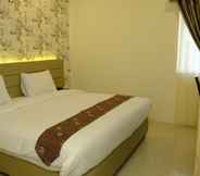 Bedroom 6 Hotel Grand Puri Perintis