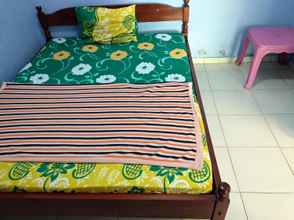 ห้องนอน 4 Penginapan Ratna Mulya