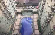 Swimming Pool 6 The Suites Metro Apartemen by Astha