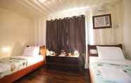 Bedroom 6 RedDoorz Plus near Puerto Princesa City Hall