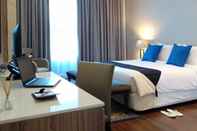 Bedroom Azana Suite Hotel Antasari