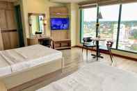 Kamar Tidur New Dawn Hotel Plus