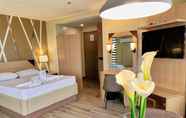 Kamar Tidur 2 New Dawn Hotel Plus