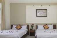 Kamar Tidur Smile Hotel