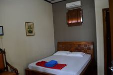 寝室 Sartika Hotel