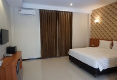 Bedroom 6 Go Hotel Maumere