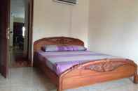 Bedroom Kondominium Pantai Carita Utara by Jay-Utara 3BR