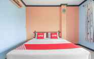 Kamar Tidur 4 OYO 1145 Prickhom Garden Hotel