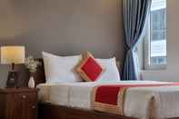 ห้องนอน Delicate Serviced Apartment And Hotel