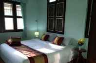 Kamar Tidur Maliwan Holiday Home 