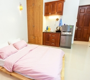 Phòng ngủ 7 Master Suite Guesthouse - Taga Home