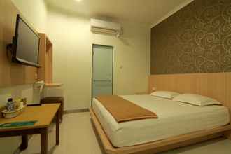 Kamar Tidur 4 Family Budget Hotels F77