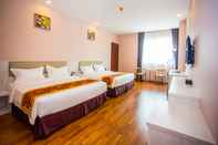 Kamar Tidur Austin Park Hotel