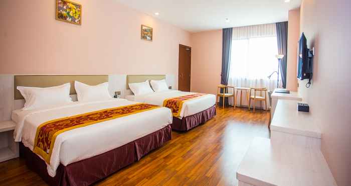 Kamar Tidur Austin Park Hotel