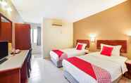 Kamar Tidur 3 Super OYO 447 Comfort Hotel Meru