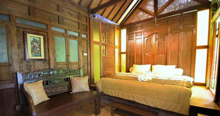 Bedroom Ethnic Room at Omah Gladak by Omah Bungah