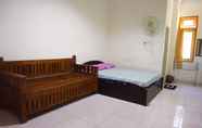 Kamar Tidur 6 Homey Home Guest House 