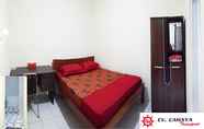 Bedroom 2 Budget Room at Homestay Cahaya Transport