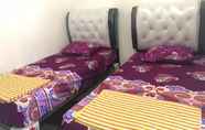 Kamar Tidur 5 Bunga Homestay