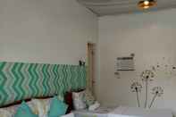 Kamar Tidur RL Puriran Homestay