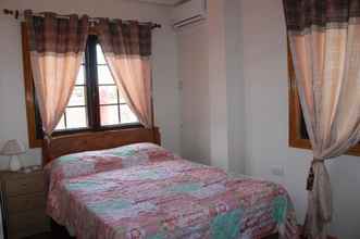 Phòng ngủ 4 Vic and Cita Homestay