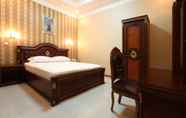 Bedroom 7 Dmonty Hotel Padang