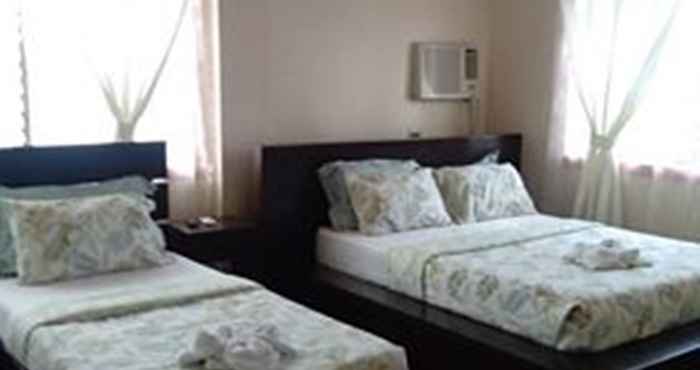 Kamar Tidur Florabell's Iraya Guesthouse