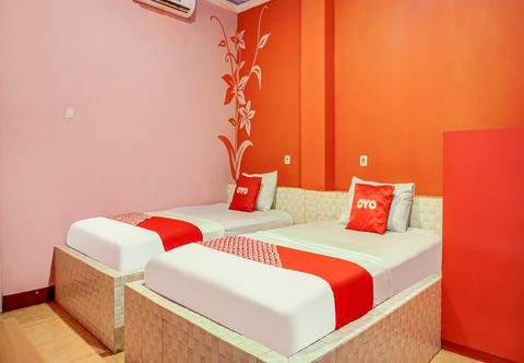 卧室 Capital O 91034 Hotel Grand Kenari