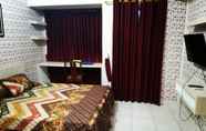 Bedroom 2 Apartemen Margonda Residence 1 & 2 by Andrew