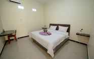 Bedroom 4 Happy Holiday Homestay